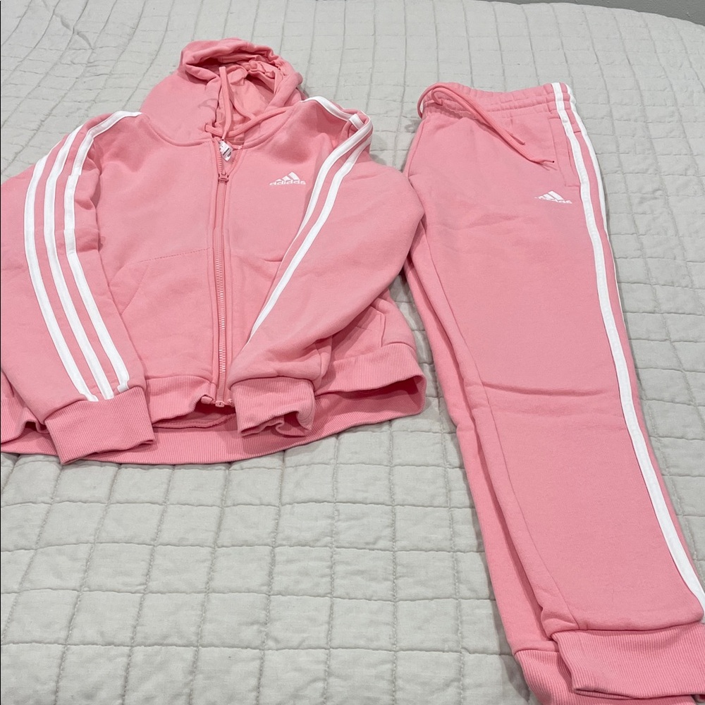 Adidas women’s Pink Joggers with White Stripes